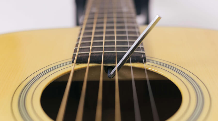 آموزش تنظیم اکشن گیتار از طریق جابجایی تراس راد